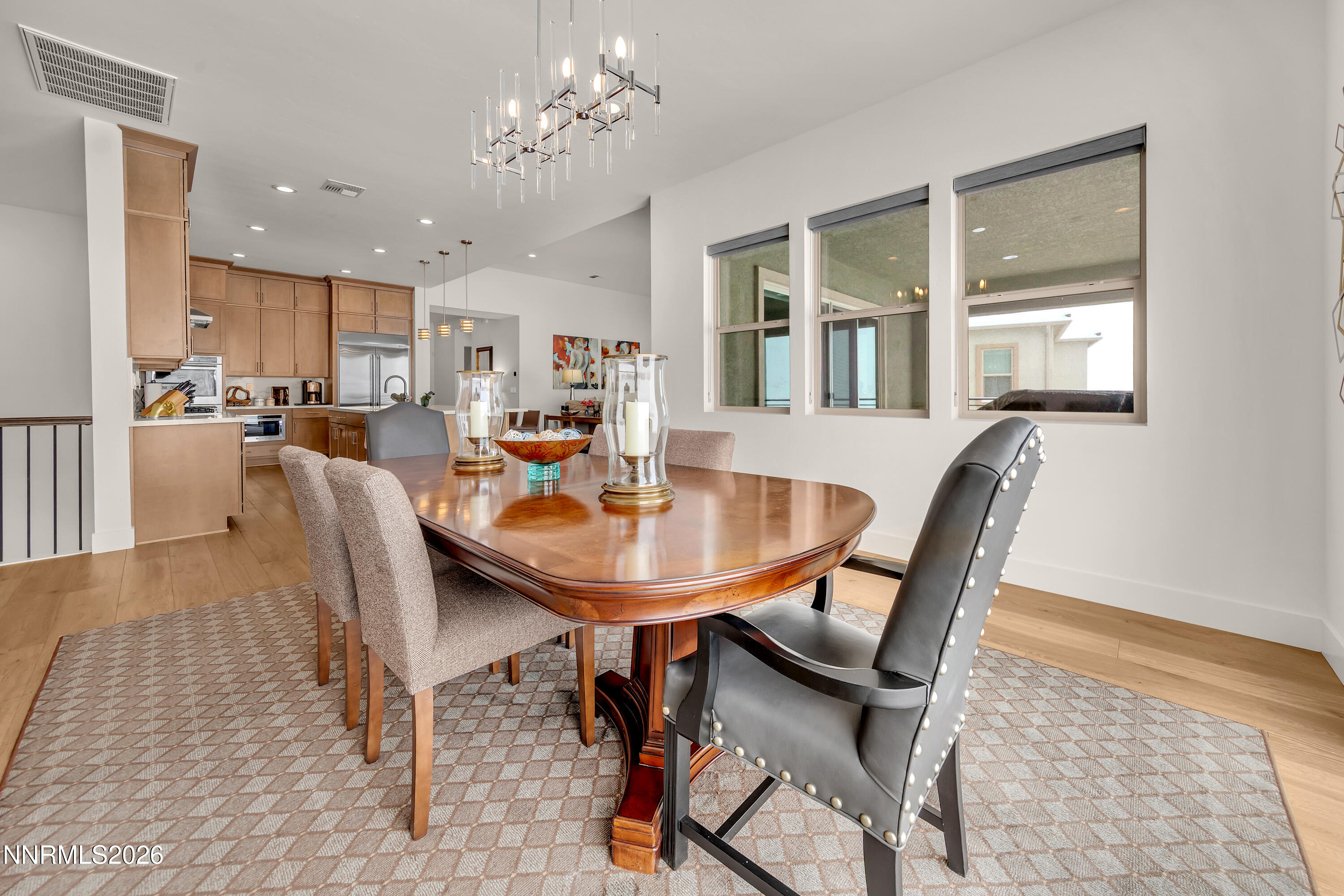 9109 Wild Skies Way Reno, NV 89523 - Photo 46 of 81 a view of a dining room with furniture