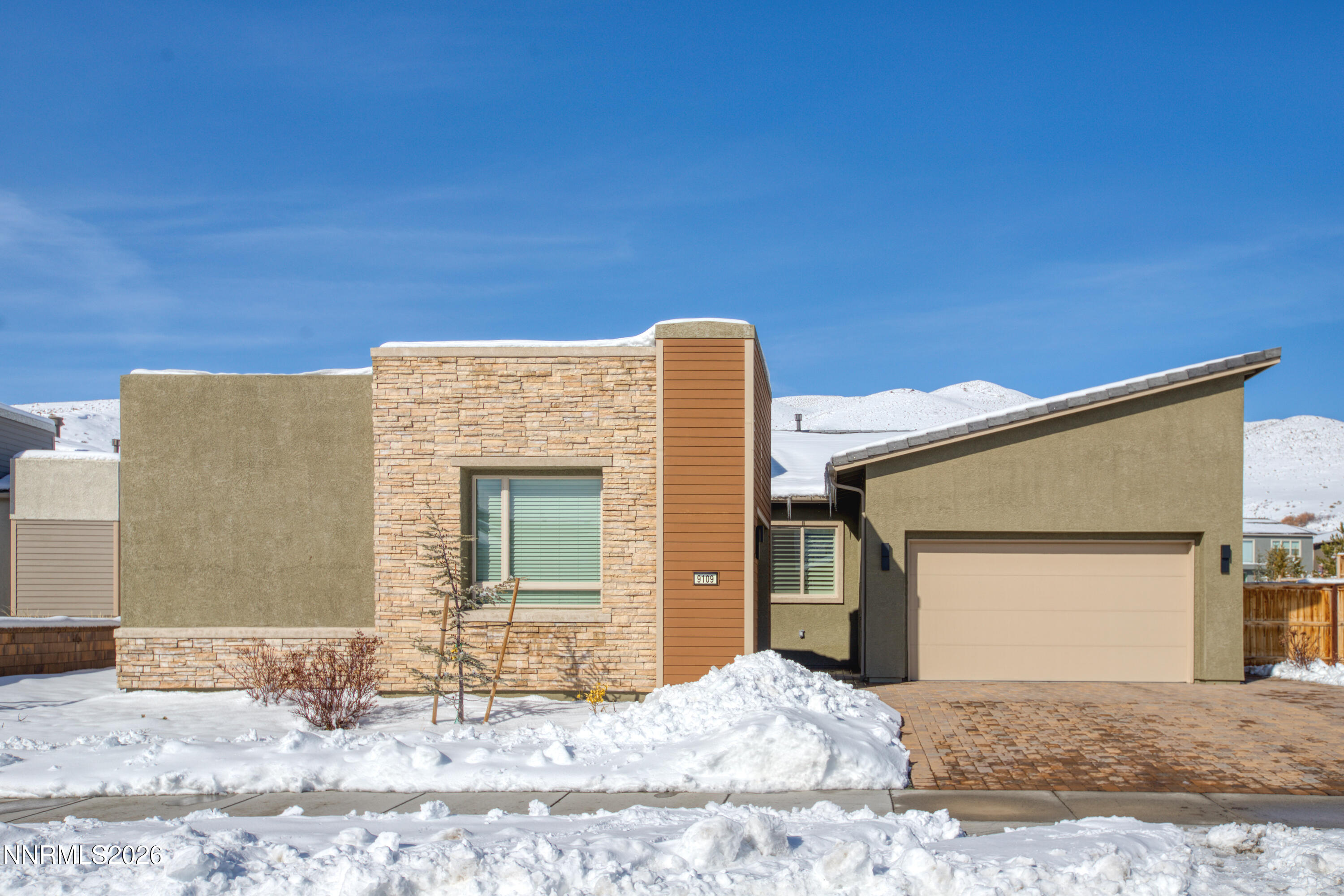 9109 Wild Skies Way Reno, NV 89523 - Photo 47 of 81 a view of a house with a outdoor space