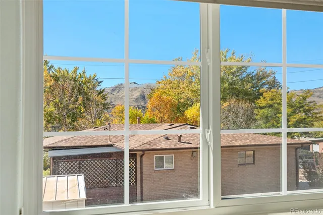 a view of a door and a window