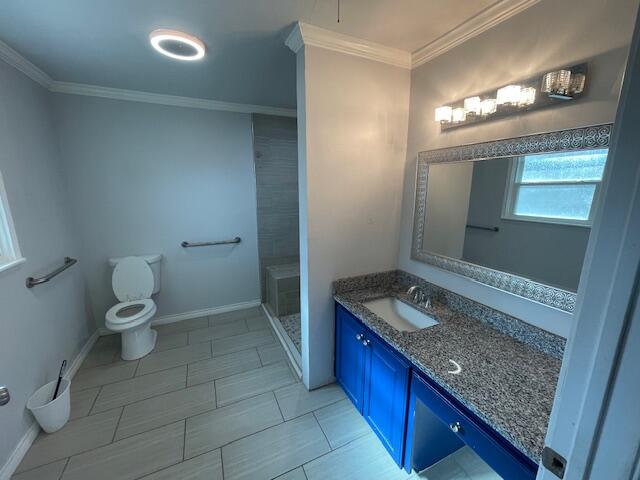 200 East 23rd Street Littlefield, TX 79339 - Photo 11 of 22 a bathroom with a granite countertop sink a toilet and a mirror