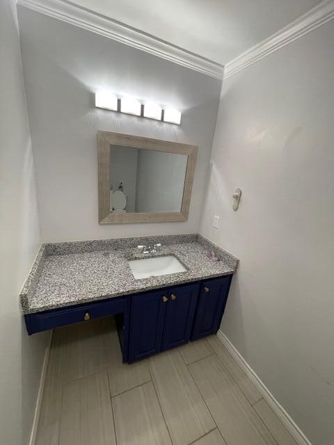 200 East 23rd Street Littlefield, TX 79339 - Photo 15 of 22 a bathroom with a sink and a mirror