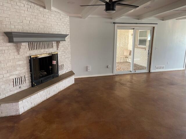 200 East 23rd Street Littlefield, TX 79339 - Photo 9 of 22 an empty room with windows and fireplace