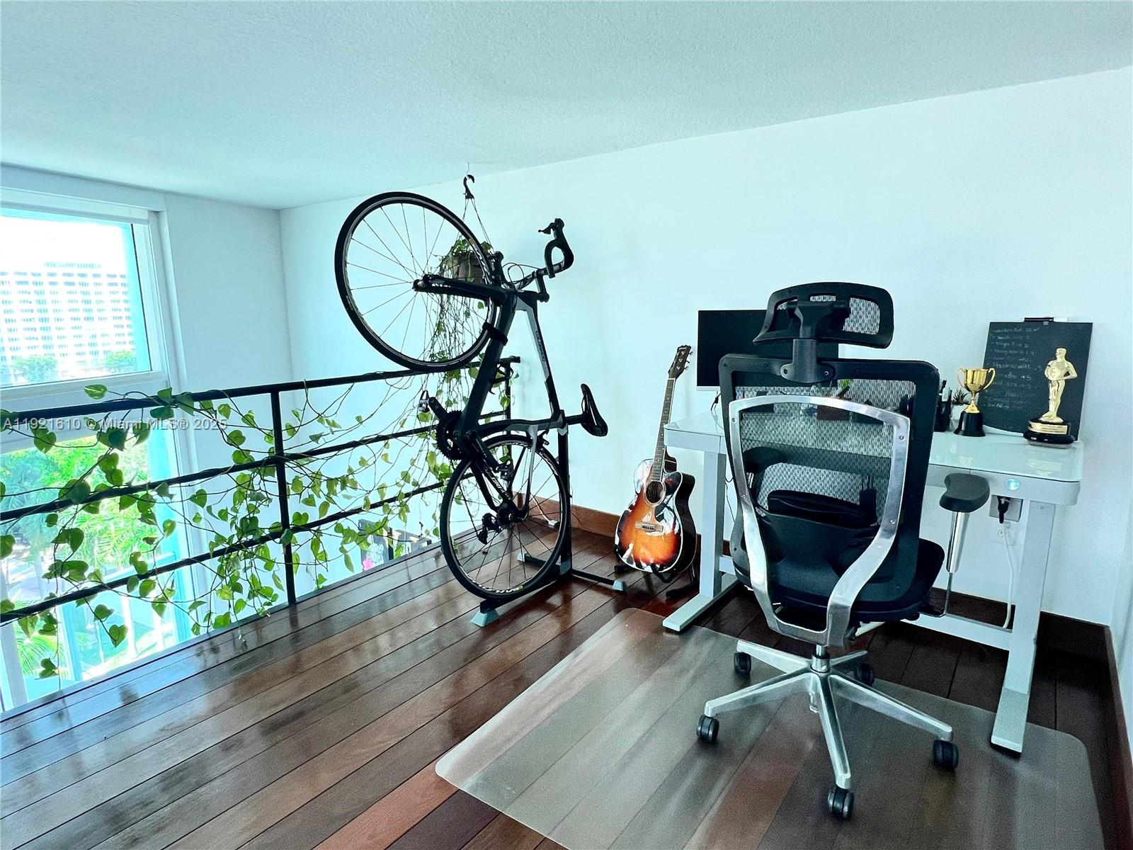 1900 North Bayshore Drive, Unit 909 Miami, FL 33132 - Photo 18 of 23 a view of a room with gym equipment