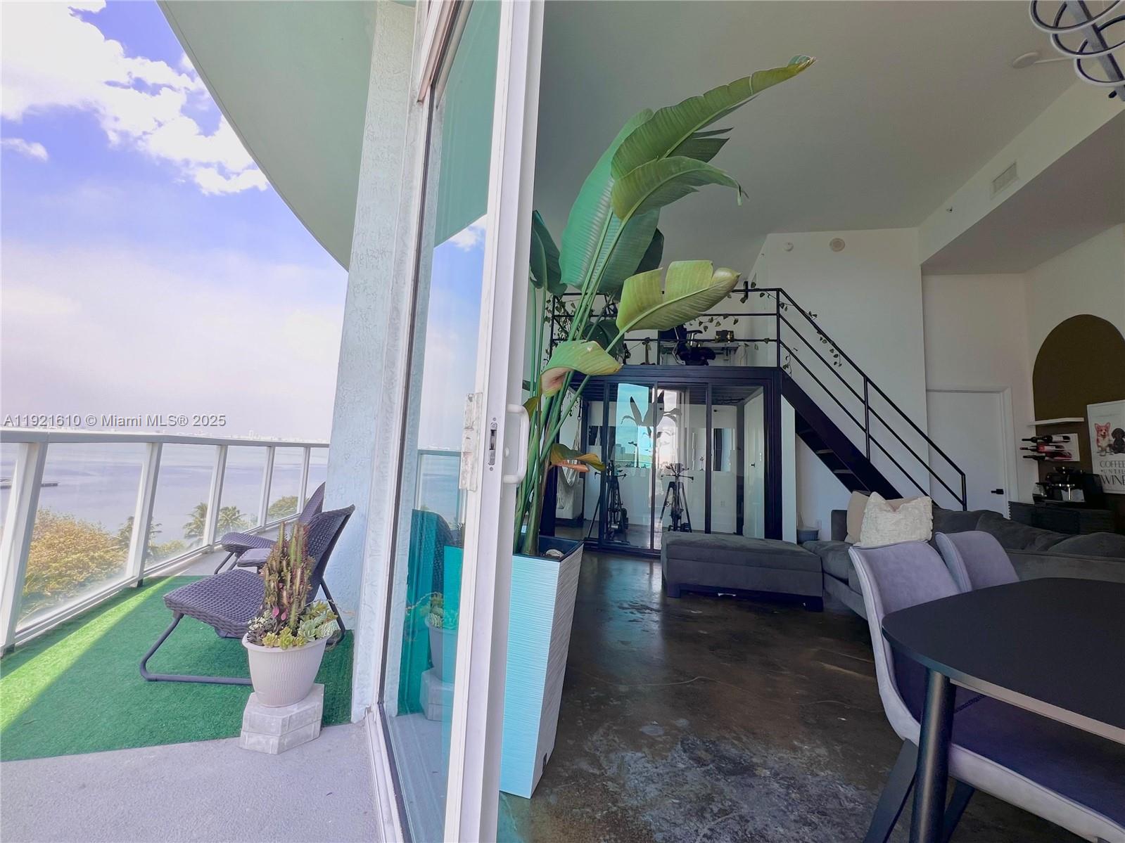1900 North Bayshore Drive, Unit 909 Miami, FL 33132 - Photo 21 of 23 a view of entryway livingroom and hall