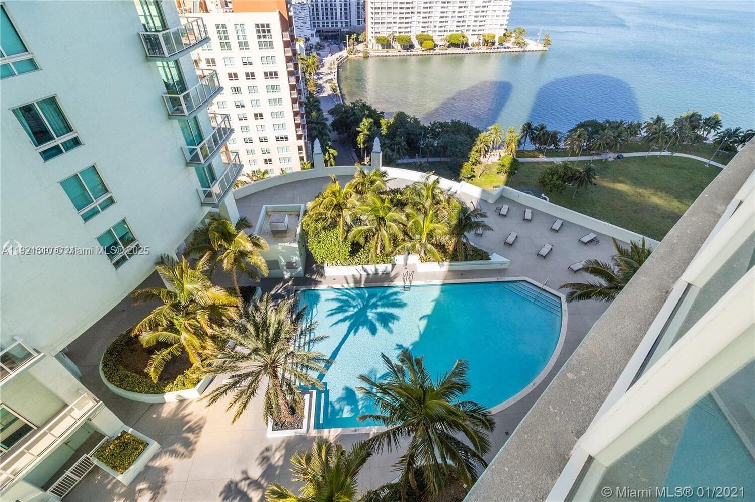 1900 North Bayshore Drive, Unit 909 Miami, FL 33132 - Photo 23 of 23 an aerial view of a house with outdoor space and a lake view