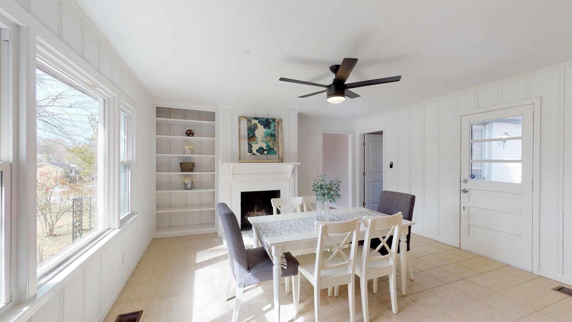 3064 Anderson Road Nashville, TN 37217 - Photo 11 of 29 a view of a dining room with furniture window and wooden floor
