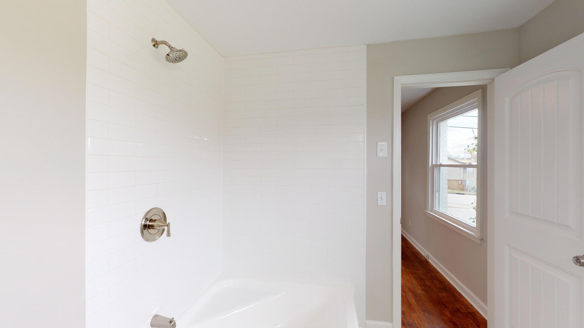 3064 Anderson Road Nashville, TN 37217 - Photo 21 of 29 a bathroom with a shower