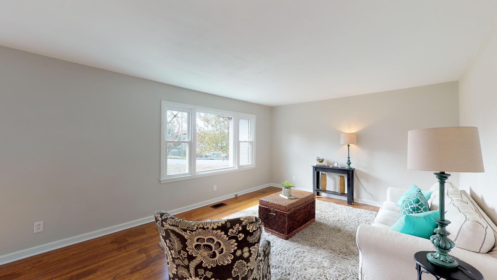 3064 Anderson Road Nashville, TN 37217 - Photo 6 of 29 a living room with furniture and a lamp