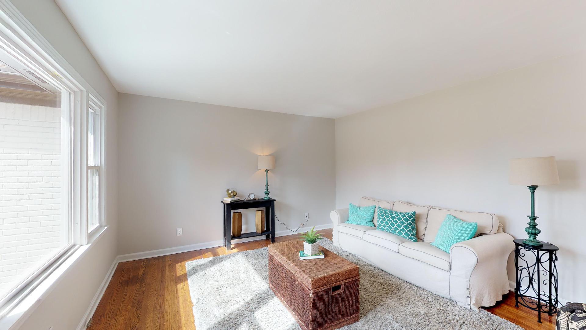 3064 Anderson Road Nashville, TN 37217 - Photo 7 of 29 a living room with furniture and a fireplace