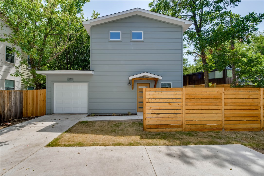 a view of a backyard of the house