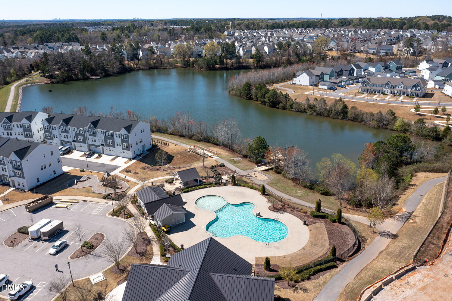 1708 Highpoint Street Wake Forest, NC 27587 - Photo 46 of 63 an aerial view of a house with a lake view