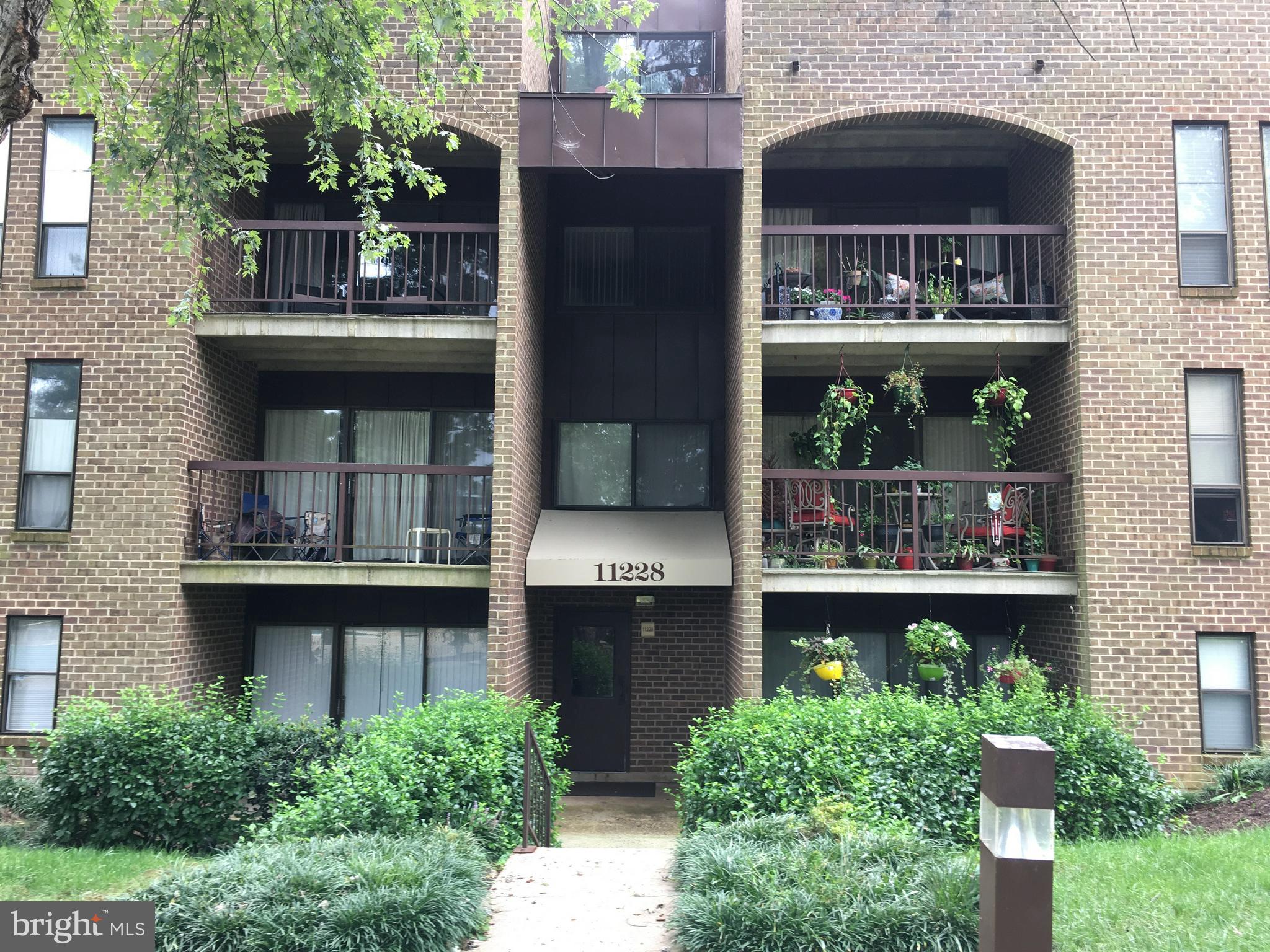 11228 Chestnut Grove Square, Unit 129 Reston, VA 20190 - Photo 1 of 12 Exterior (General)