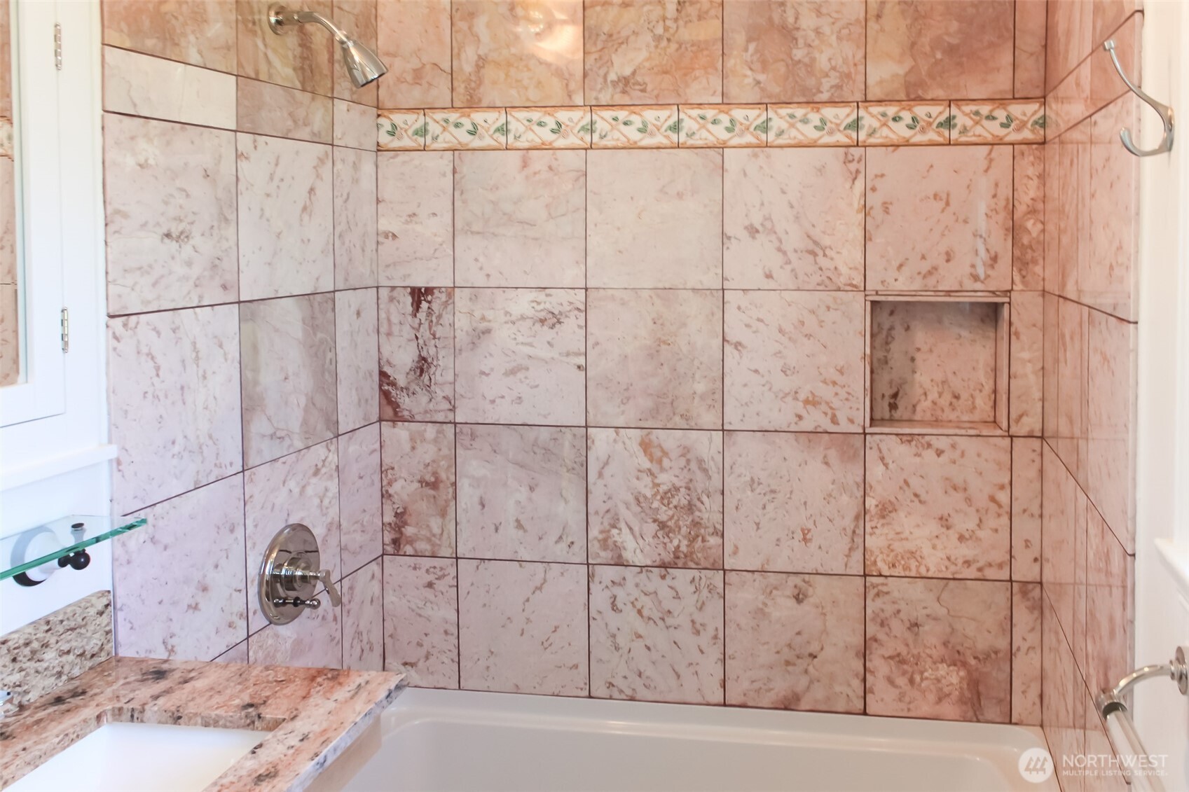 8001 Densmore Avenue North Seattle, WA 98103 - Photo 11 of 22 a bathroom with a sink and a shower