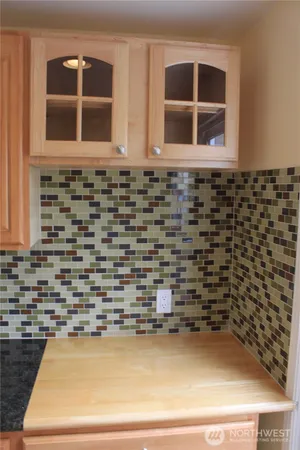 a bathroom with a blue shower