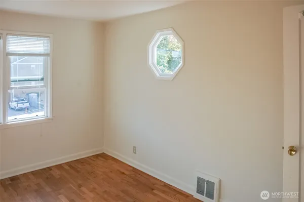an empty room with window