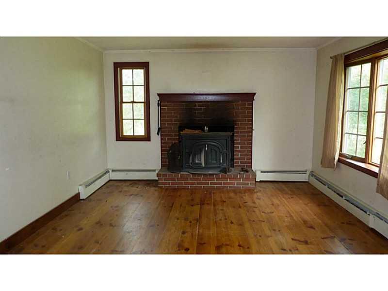 102 Cobbs Bridge Road New Gloucester, ME 04260 - Photo 8 of 19 Living Room. Brick Fireplace with...