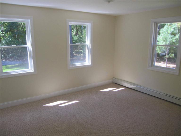 560 Skunknet Road Centerville, MA 02632 - Photo 15 of 24 an empty room with a window