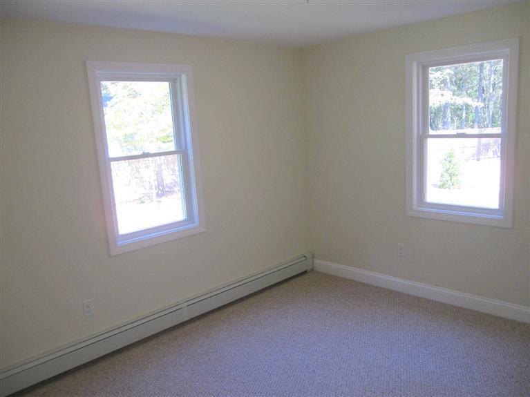 560 Skunknet Road Centerville, MA 02632 - Photo 16 of 24 an empty room with a window