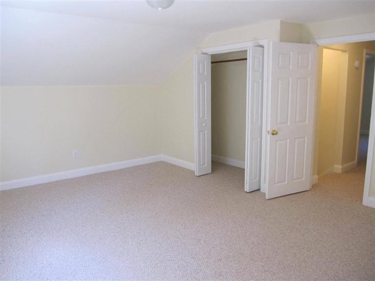 560 Skunknet Road Centerville, MA 02632 - Photo 18 of 24 an empty room with closet area
