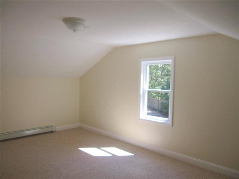 560 Skunknet Road Centerville, MA 02632 - Photo 19 of 24 an empty room with a window