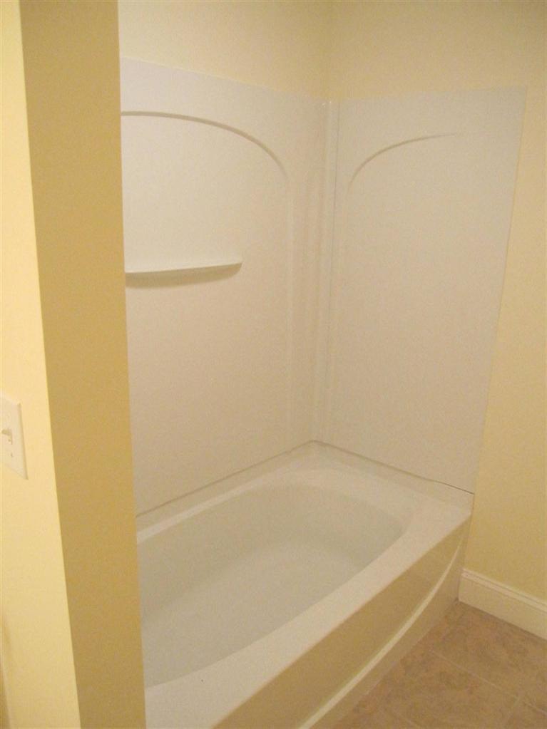 560 Skunknet Road Centerville, MA 02632 - Photo 21 of 24 a bathroom with a bathtub