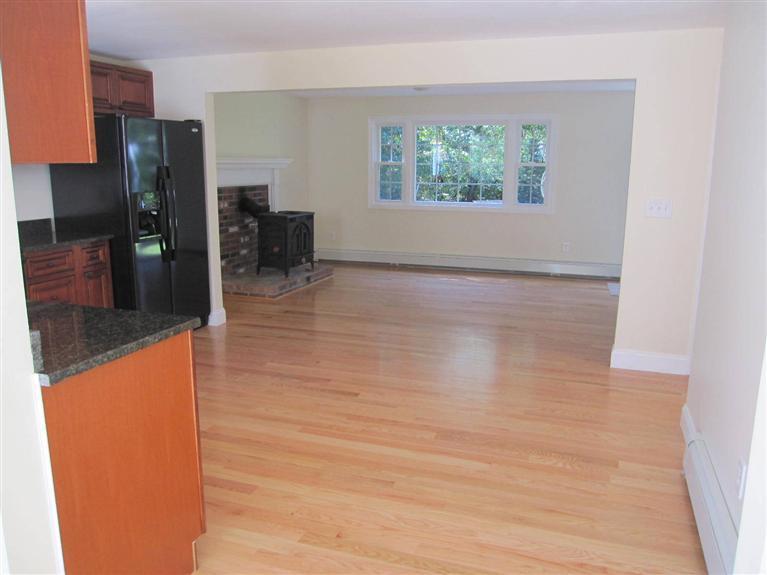 560 Skunknet Road Centerville, MA 02632 - Photo 10 of 24 an empty room with windows