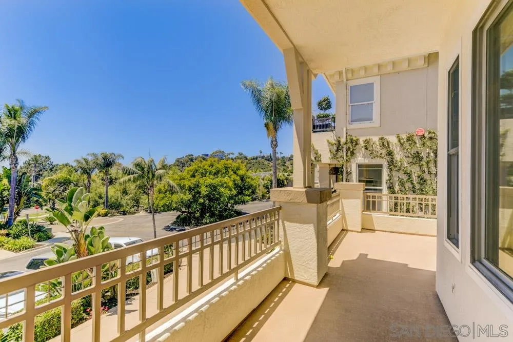 2737 MacKinnon Ranch Road Cardiff, CA 92007 - Photo 8 of 17 a view of a balcony with wooden floor and outdoor space