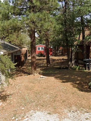 a view of a street with trees
