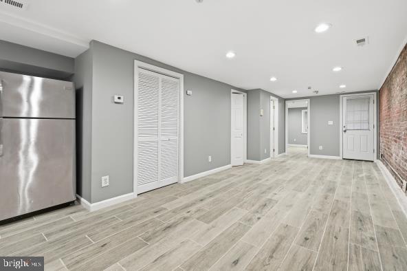 1006 K Street Northeast, Unit B Washington, DC 20002 - Photo 2 of 11 a view of an empty room with wooden floor