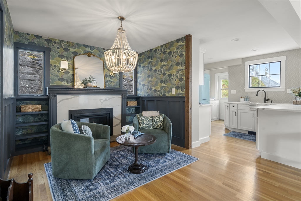 11 Gingerbread Hill Marblehead, MA 01945 - Photo 11 of 20 a living room with furniture and a fireplace