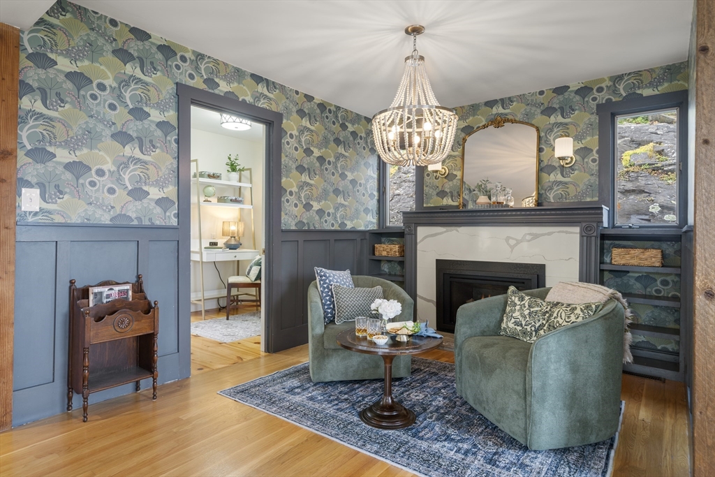 11 Gingerbread Hill Marblehead, MA 01945 - Photo 13 of 20 a living room with furniture and a fireplace