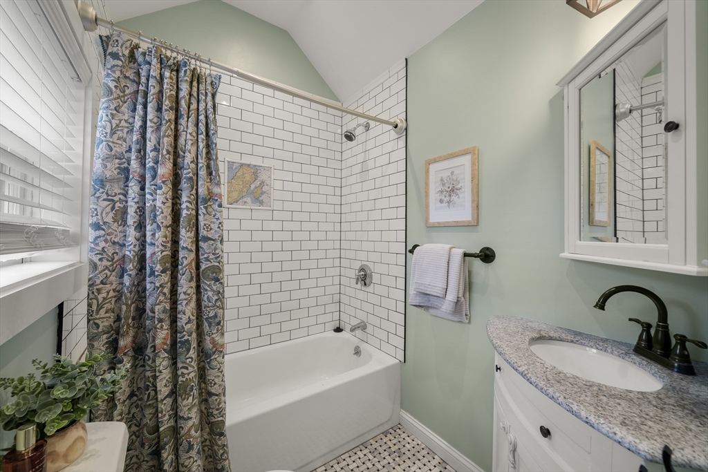 11 Gingerbread Hill Marblehead, MA 01945 - Photo 14 of 20 a bathroom with a granite countertop sink a toilet and shower