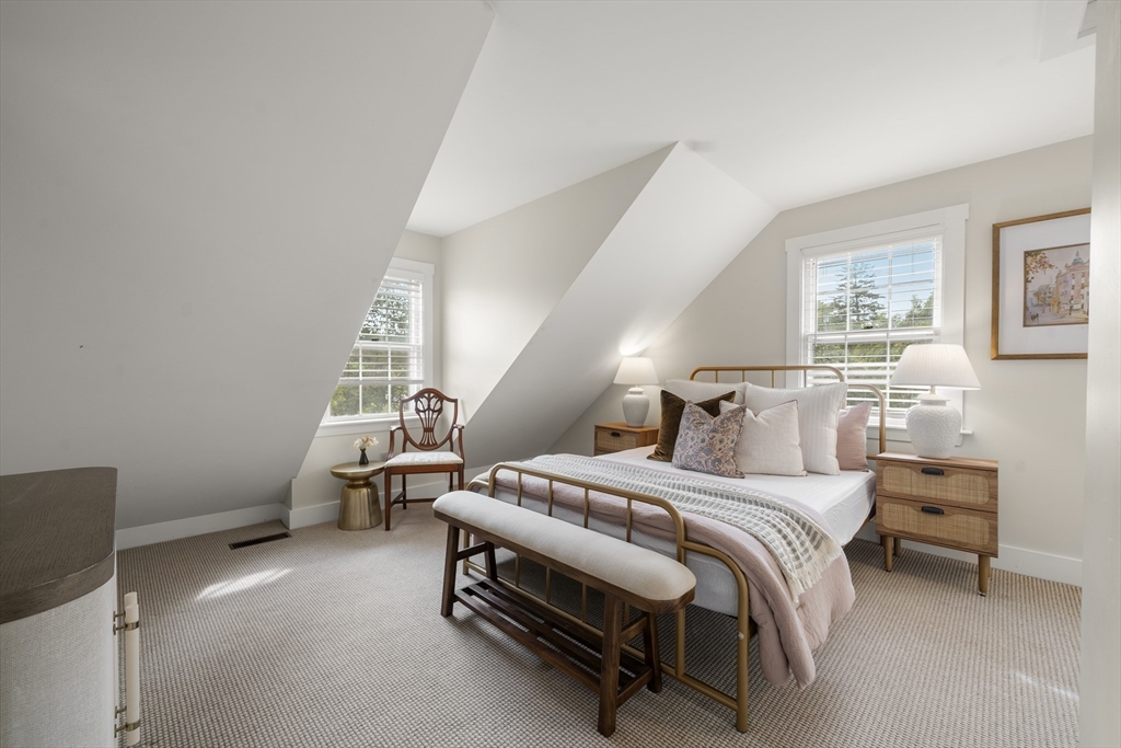 11 Gingerbread Hill Marblehead, MA 01945 - Photo 19 of 20 a bedroom with a bed and lamp