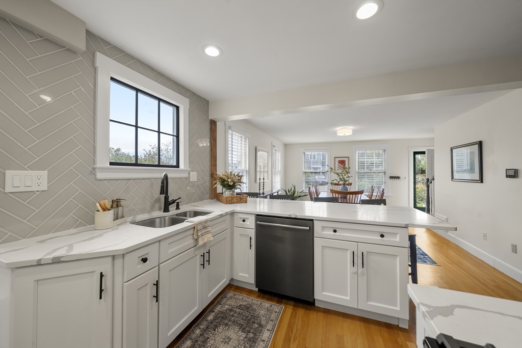 11 Gingerbread Hill Marblehead, MA 01945 - Photo 6 of 20 a kitchen with sink attached with living room