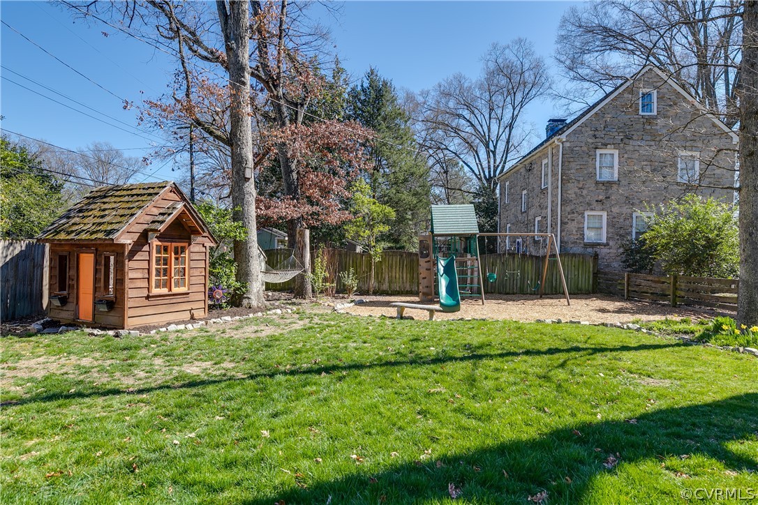 5207 Devonshire Road Richmond, VA 23225 - Photo 35 of 43 Oversized, fenced-in yard with play areas.