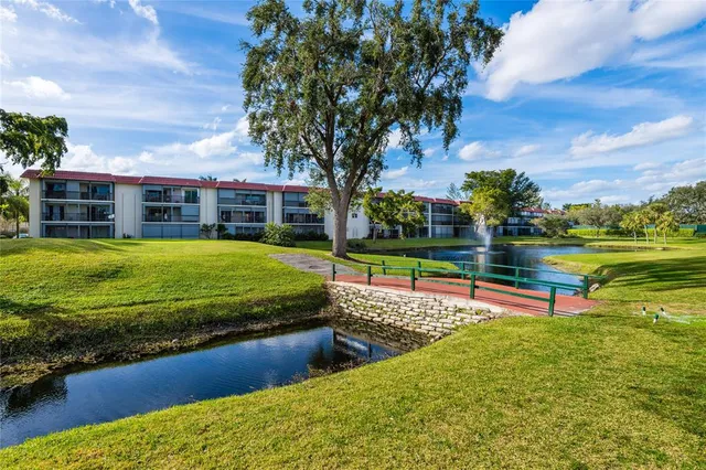 a view of a building with a swimming pool