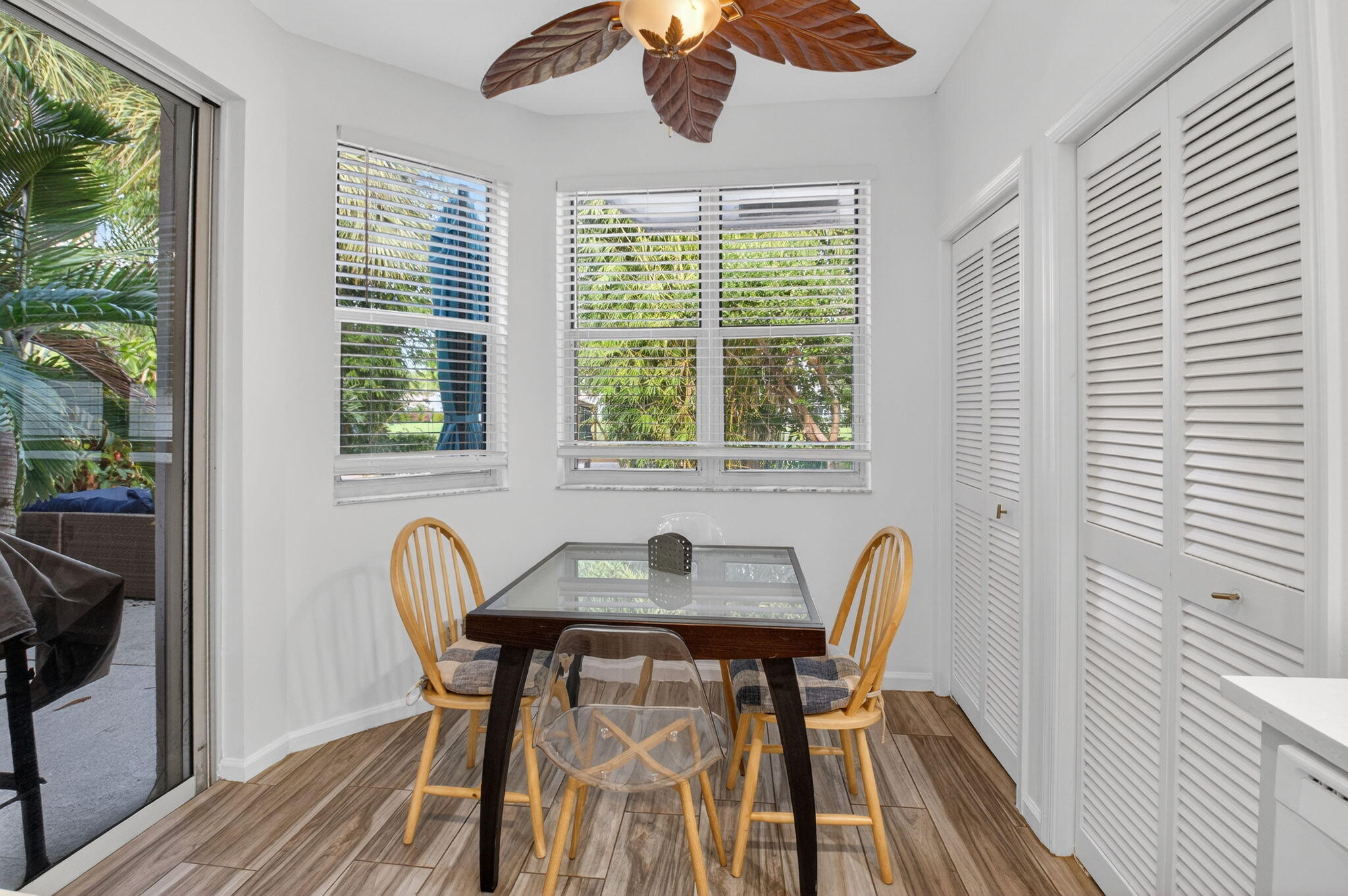 2225 Northwest 53rd Street Boca Raton, FL 33496 - Photo 11 of 46 a dining room with furniture and window