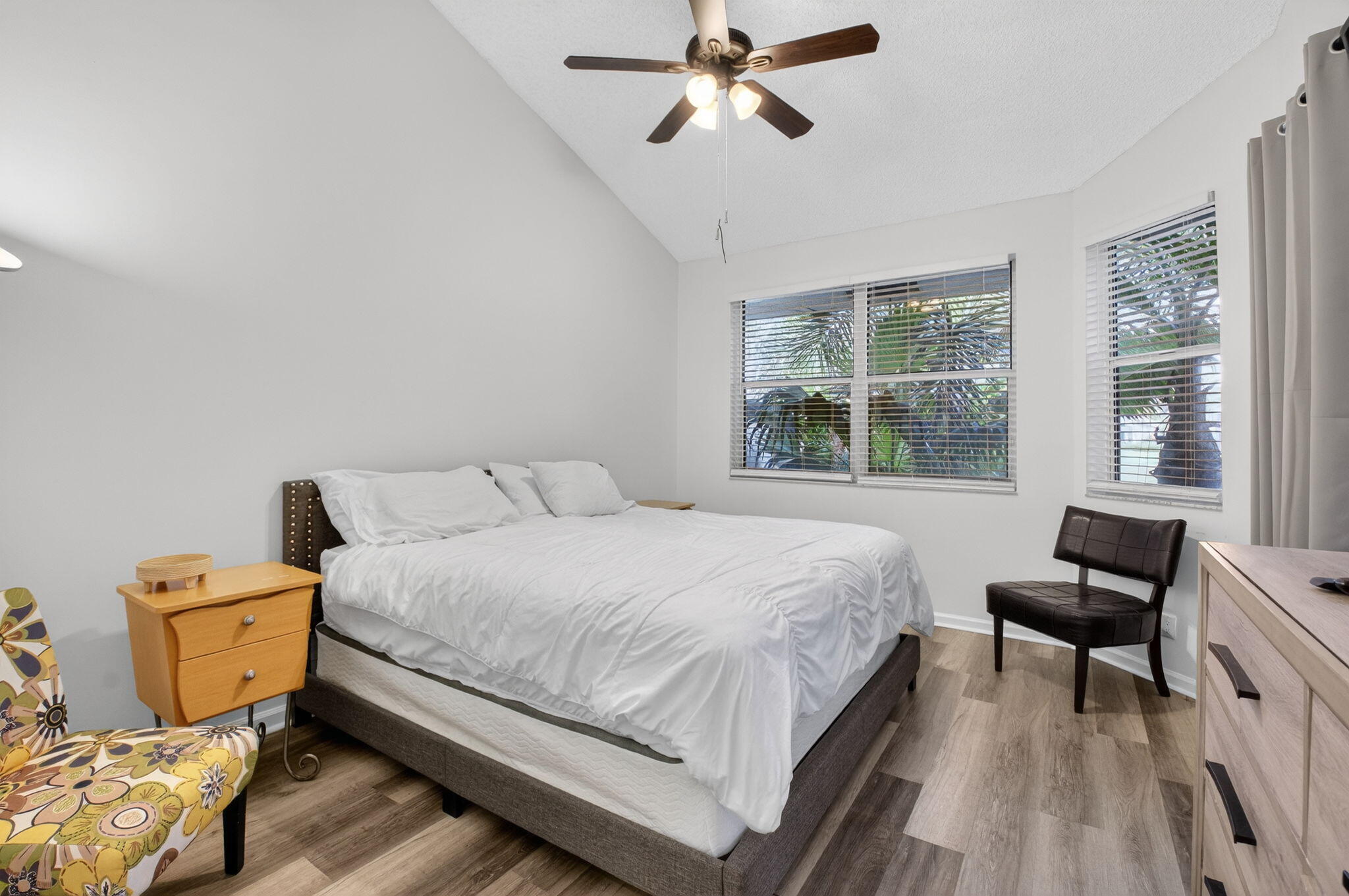 2225 Northwest 53rd Street Boca Raton, FL 33496 - Photo 16 of 46 a bedroom with a bed and a window