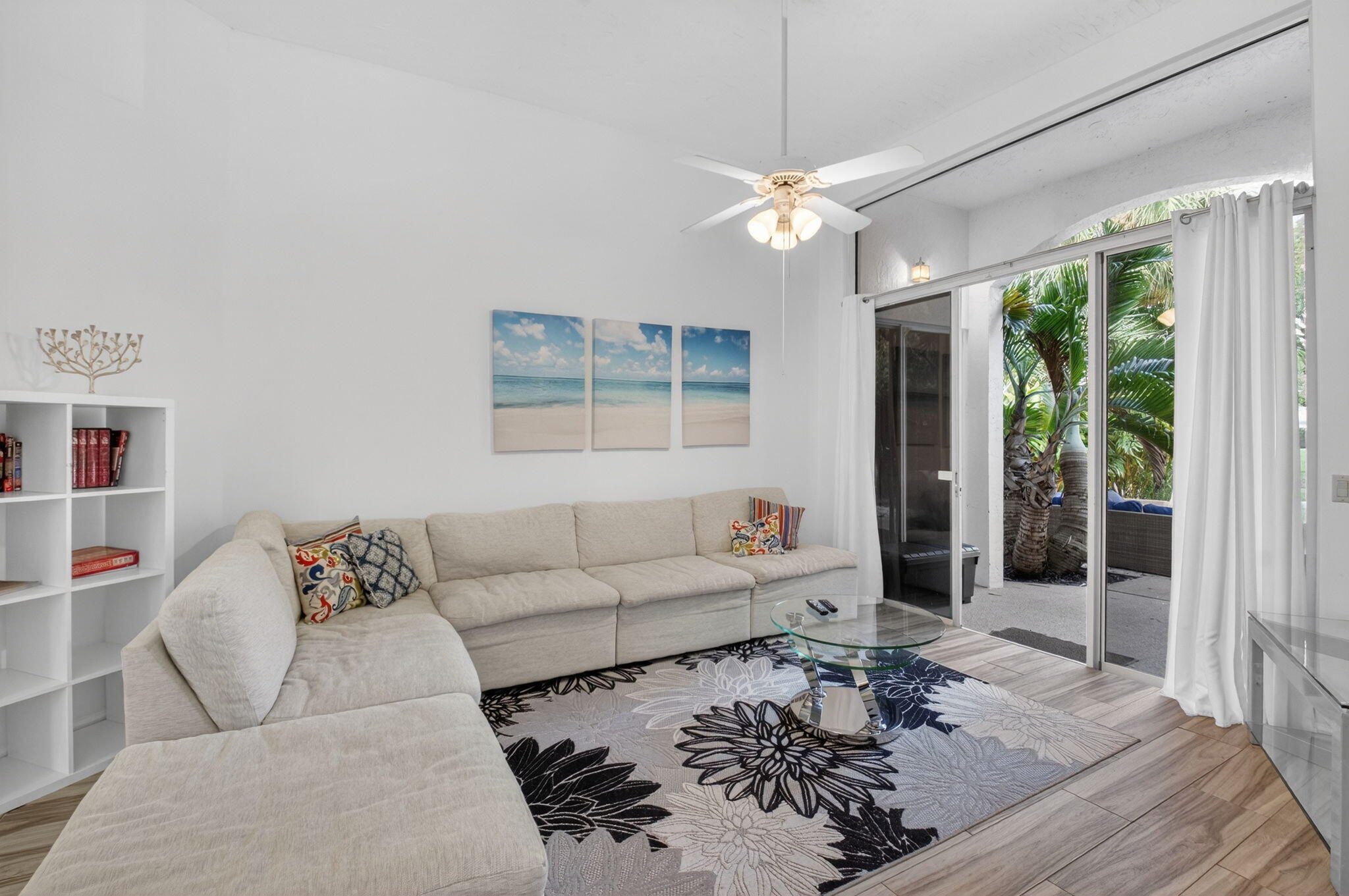 2225 Northwest 53rd Street Boca Raton, FL 33496 - Photo 7 of 46 a living room with furniture and a large window