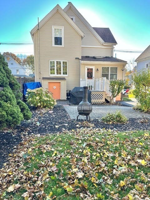 76 Stetson Avenue Swampscott, MA 01907 - Photo 19 of 20 a front view of a house with garden