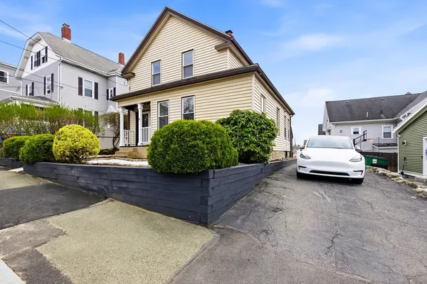 a view of a house with a garden