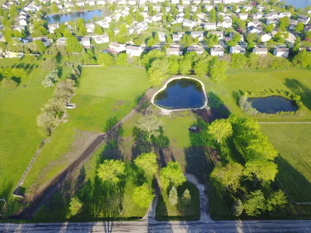 a view of lake from under an umbrella