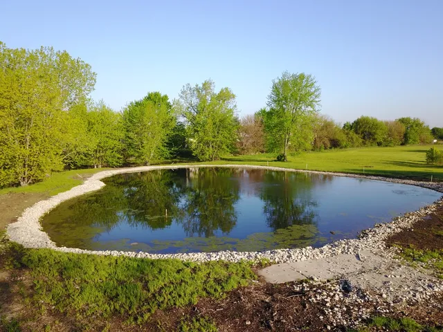 a view of a lake from a balcony