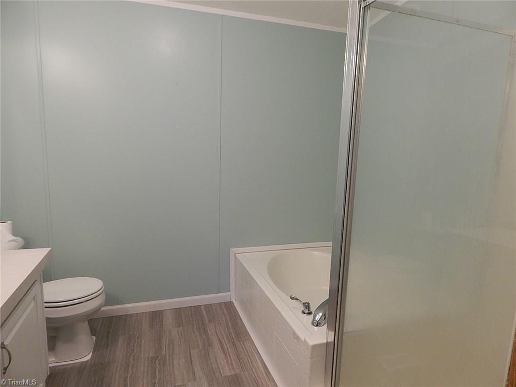 227 Simmons Road Pilot Mountain, NC 27041 - Photo 14 of 27 Separate shower in master bath.