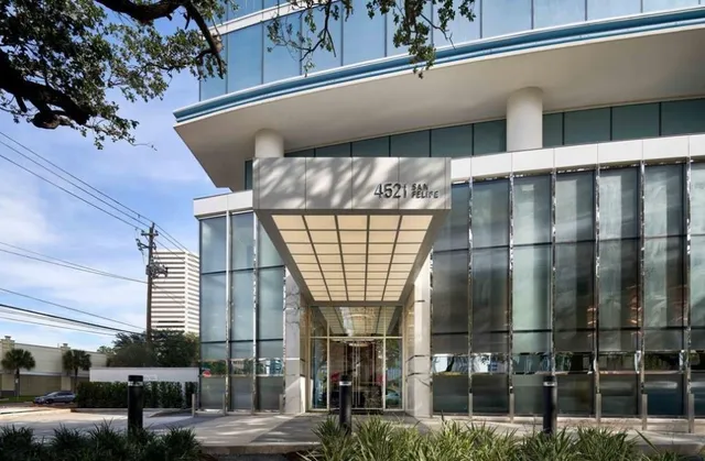 a front view of a building with street view