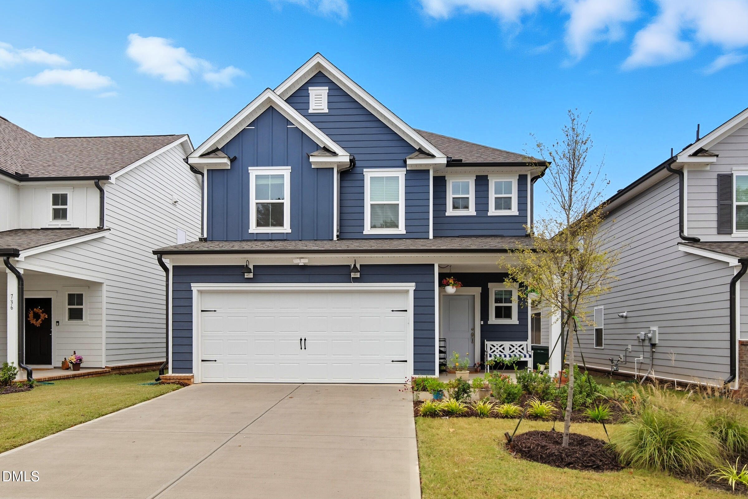 732 Denburn Place Raleigh, NC 27603 - Photo 1 of 12 a front view of a house with garden