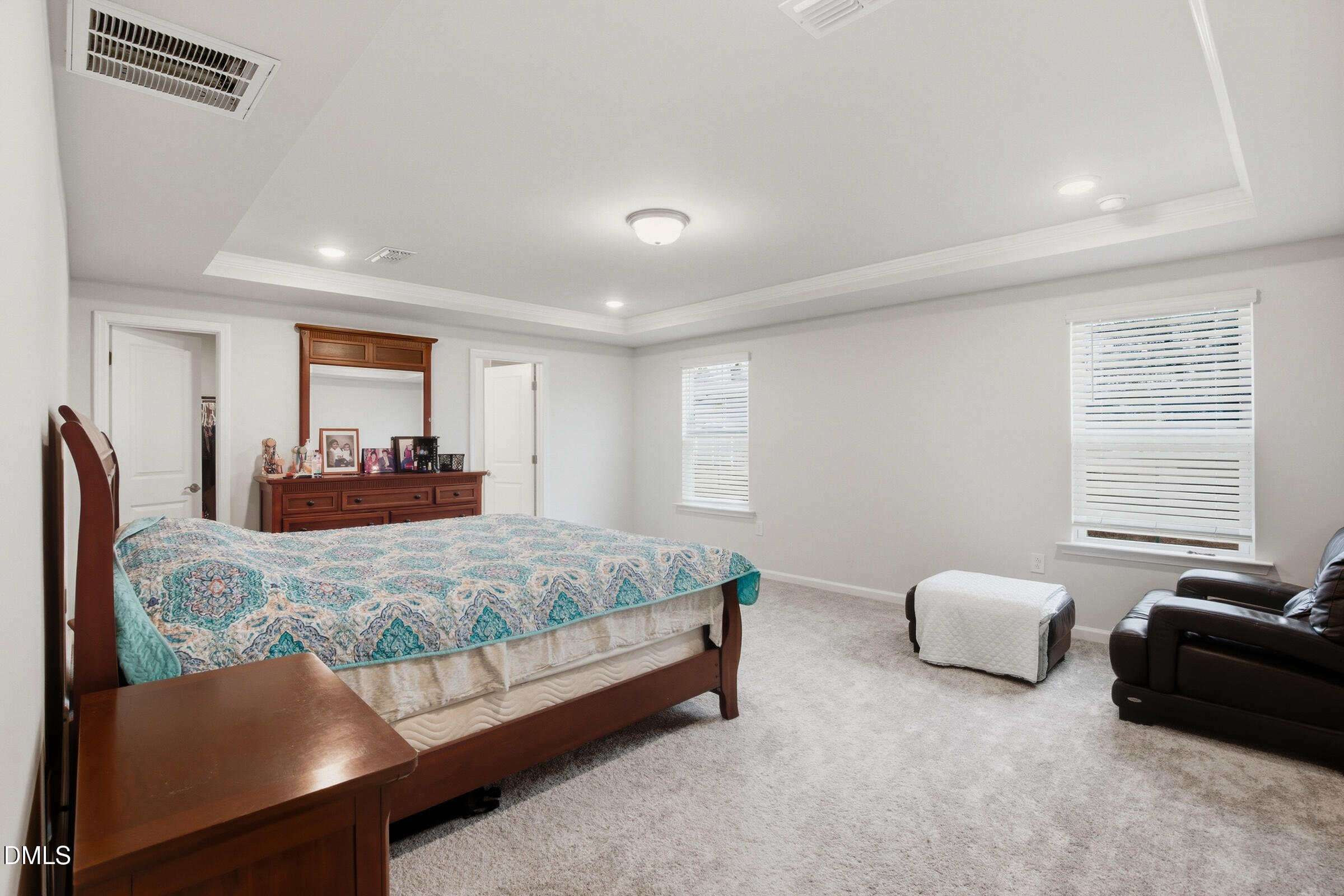 732 Denburn Place Raleigh, NC 27603 - Photo 12 of 12 a bedroom with bed and a couch
