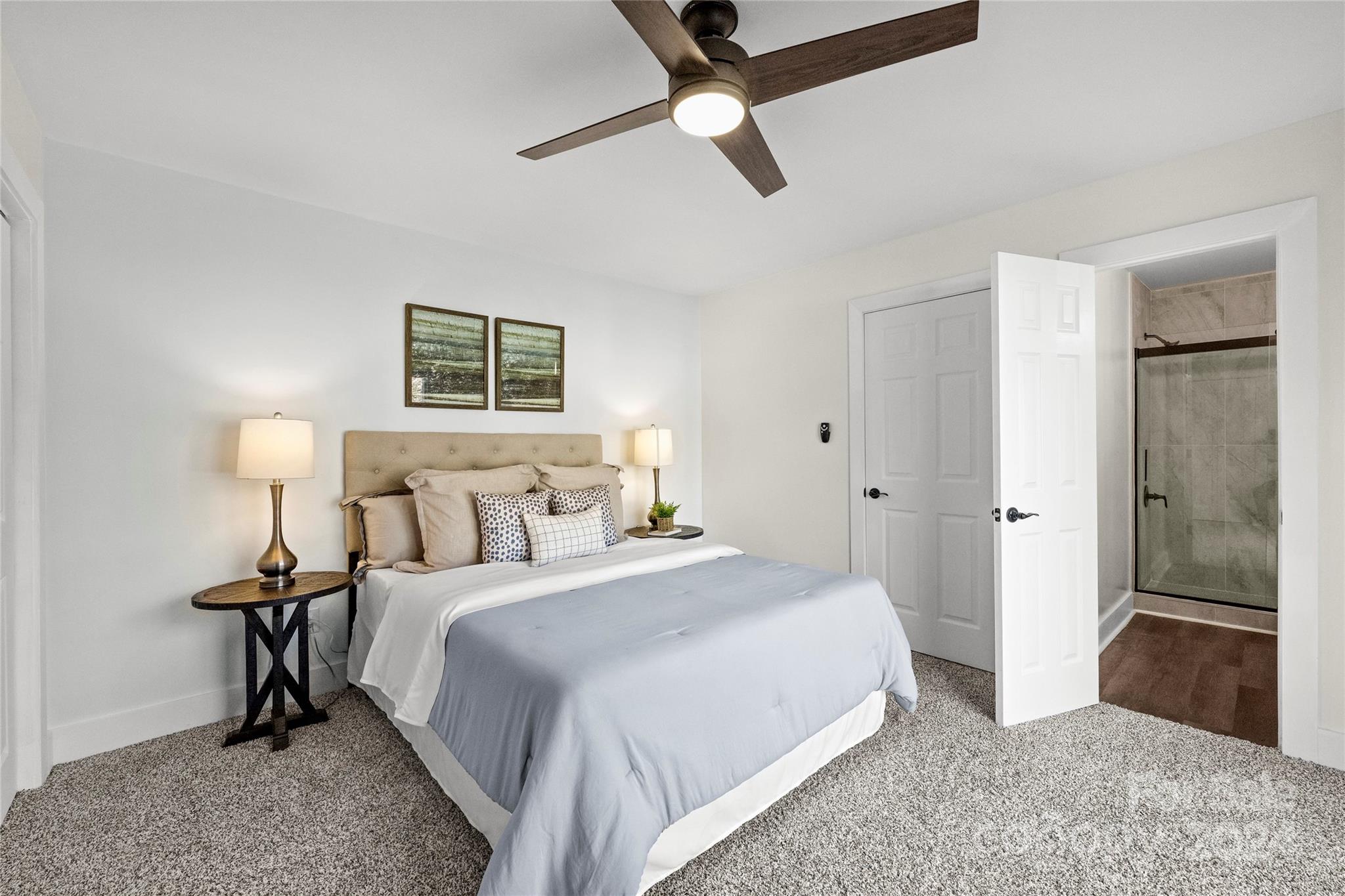 1660 Willowbrook Drive Fort Mill, SC 29708 - Photo 12 of 29 a bedroom with a bed and a walk in closet