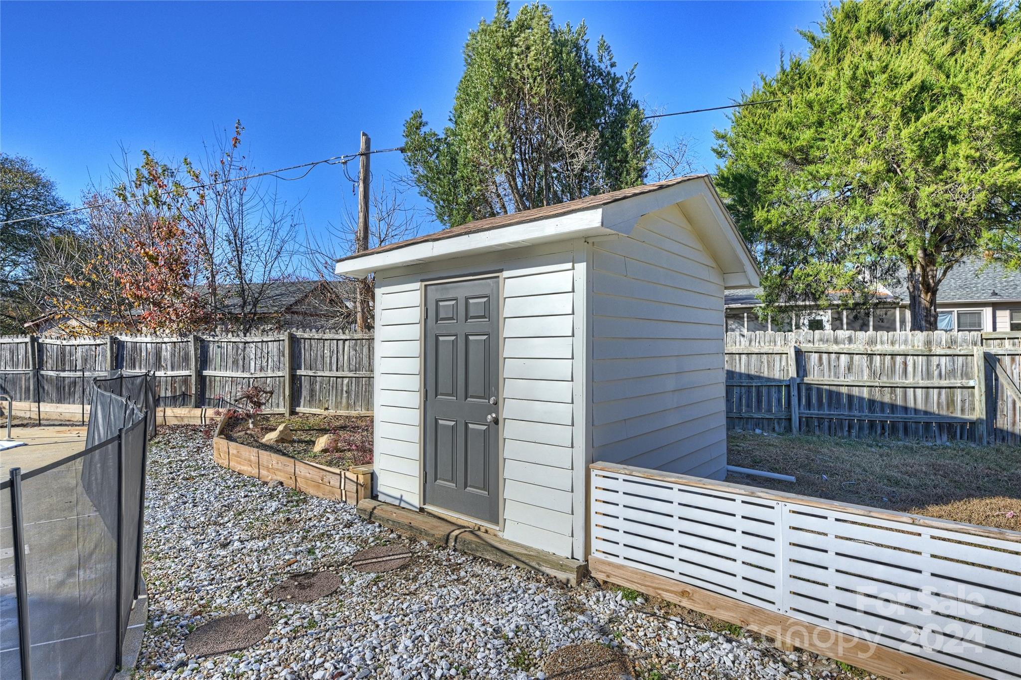 1660 Willowbrook Drive Fort Mill, SC 29708 - Photo 25 of 29 a view of a backyard and a tree