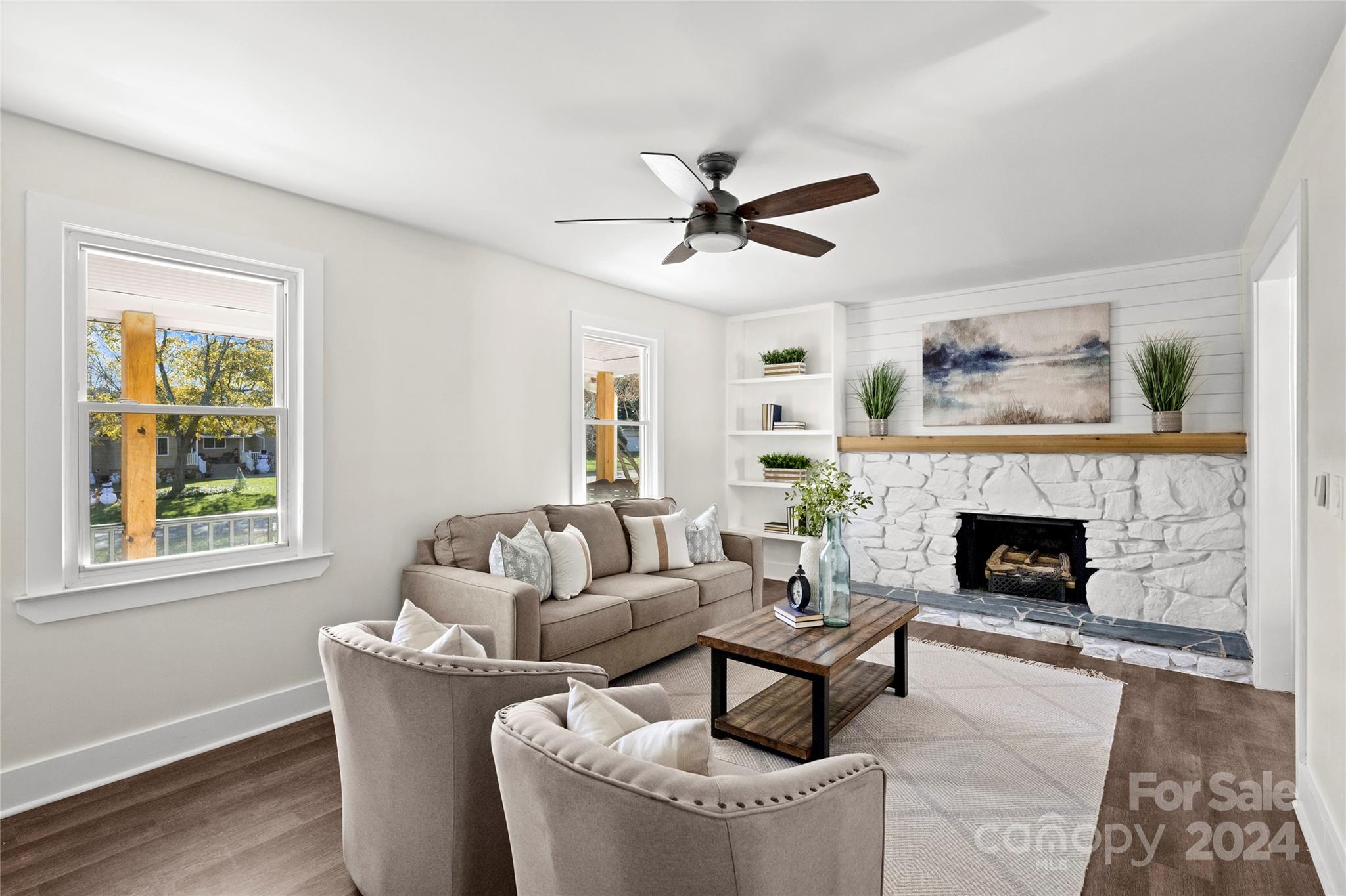1660 Willowbrook Drive Fort Mill, SC 29708 - Photo 4 of 29 a living room with furniture and a fireplace